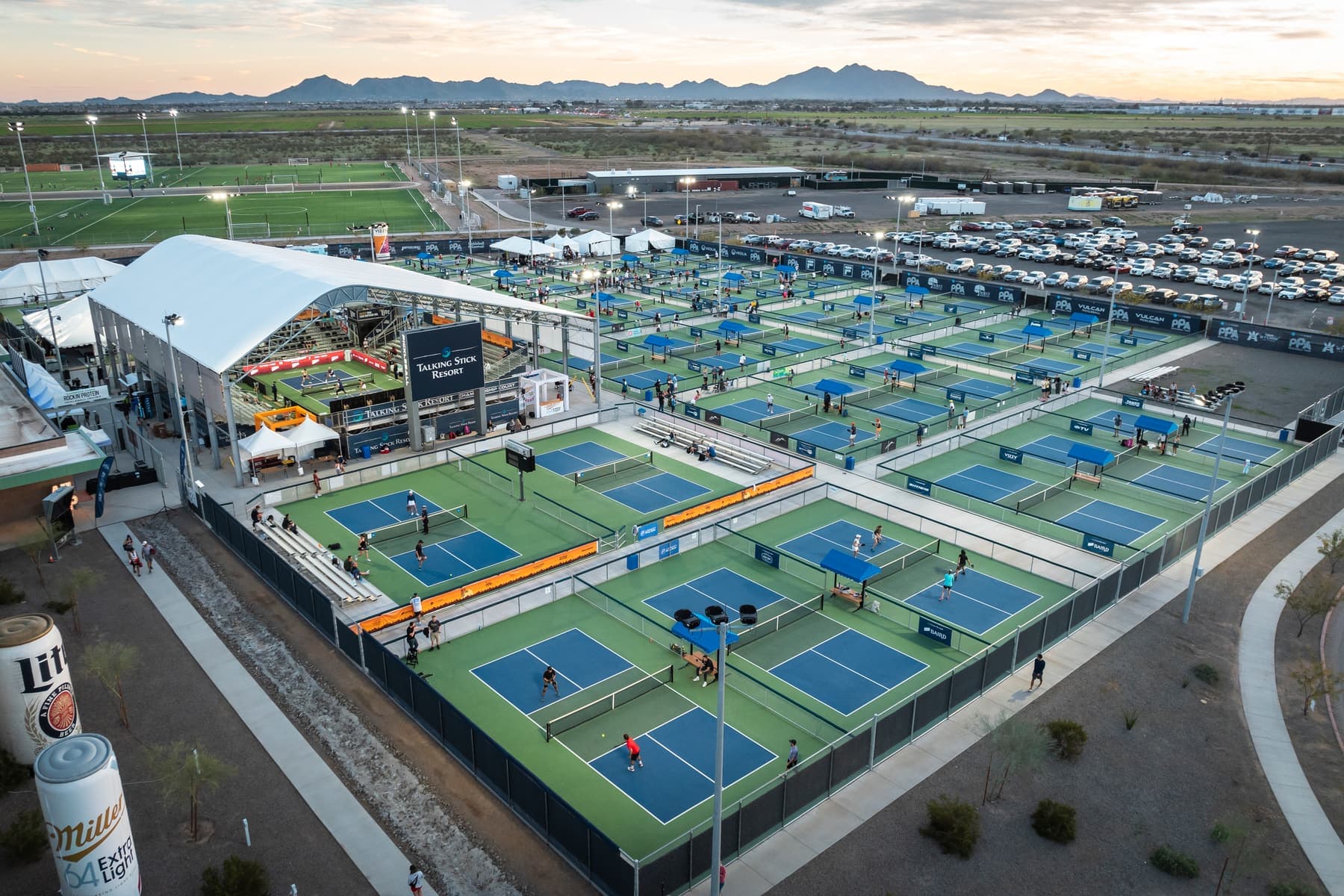 Aerial view of the tournament courts at Arizona Athletic Grounds in Mesa at sunset.