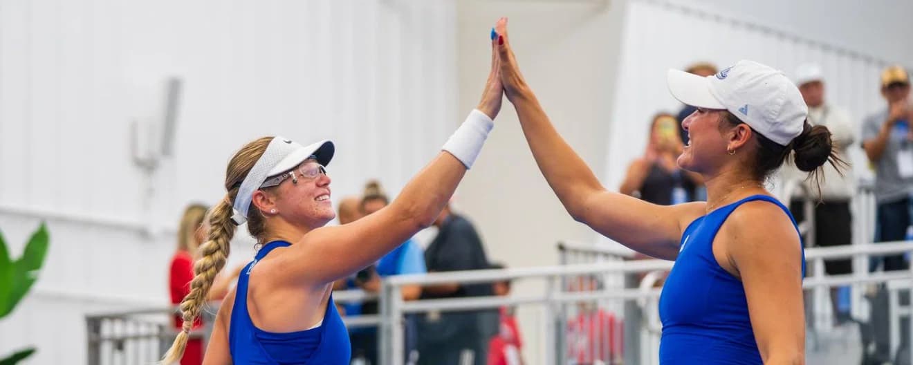 Anna Leigh Waters and Anna Bright celebrating their women's doubles title at the Veolia Chicago Cup.